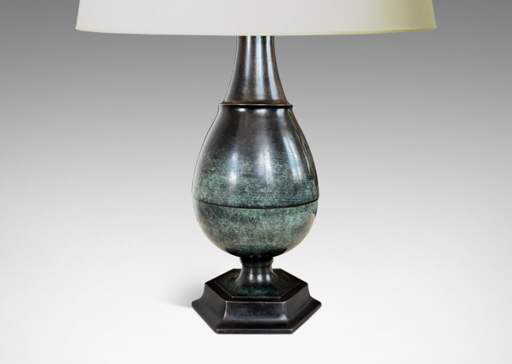Gallery BAC arge drop form perched on a mitered octagonal base, with a wonderful original patination with verdigris highlight