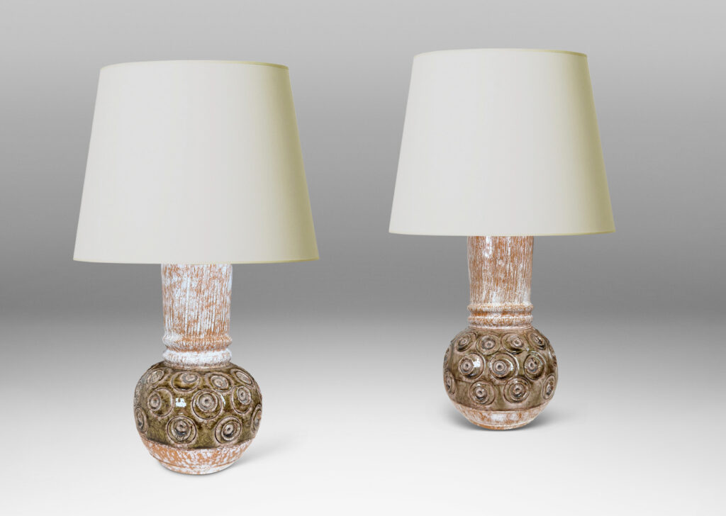 Gallery BAC plump globe forms with carved circle motifs glazed in shiny olive green-gray, and wide textured necks in partial white glaze