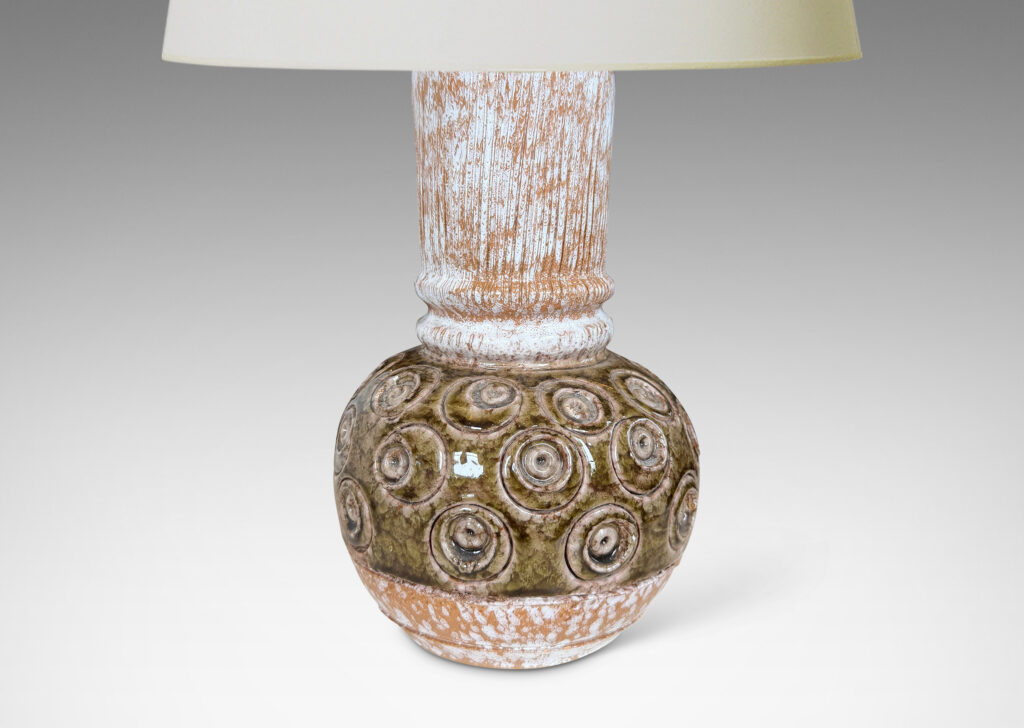 Gallery BAC plump globe forms with carved circle motifs glazed in shiny olive green-gray, and wide textured necks in partial white glaze