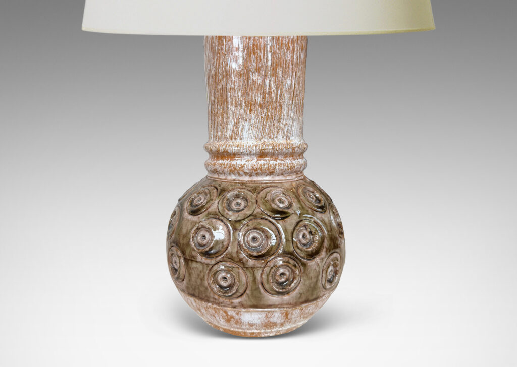 Gallery BAC plump globe forms with carved circle motifs glazed in shiny olive green-gray, and wide textured necks in partial white glaze