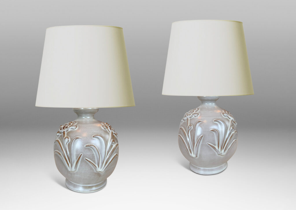 Gallery BACplump globe forms with relief pairs of flowers, lightly glazed in white
