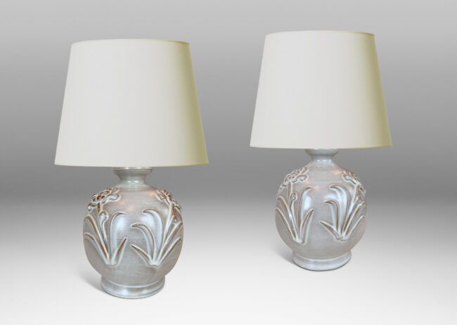 Gallery BACplump globe forms with relief pairs of flowers, lightly glazed in white