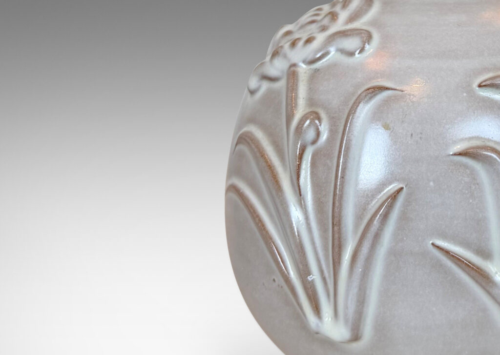 Gallery BACplump globe forms with relief pairs of flowers, lightly glazed in white