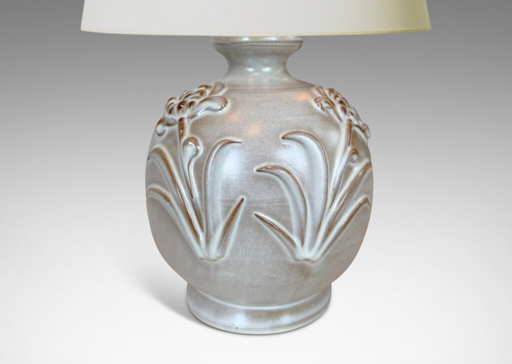 Gallery BACplump globe forms with relief pairs of flowers, lightly glazed in white