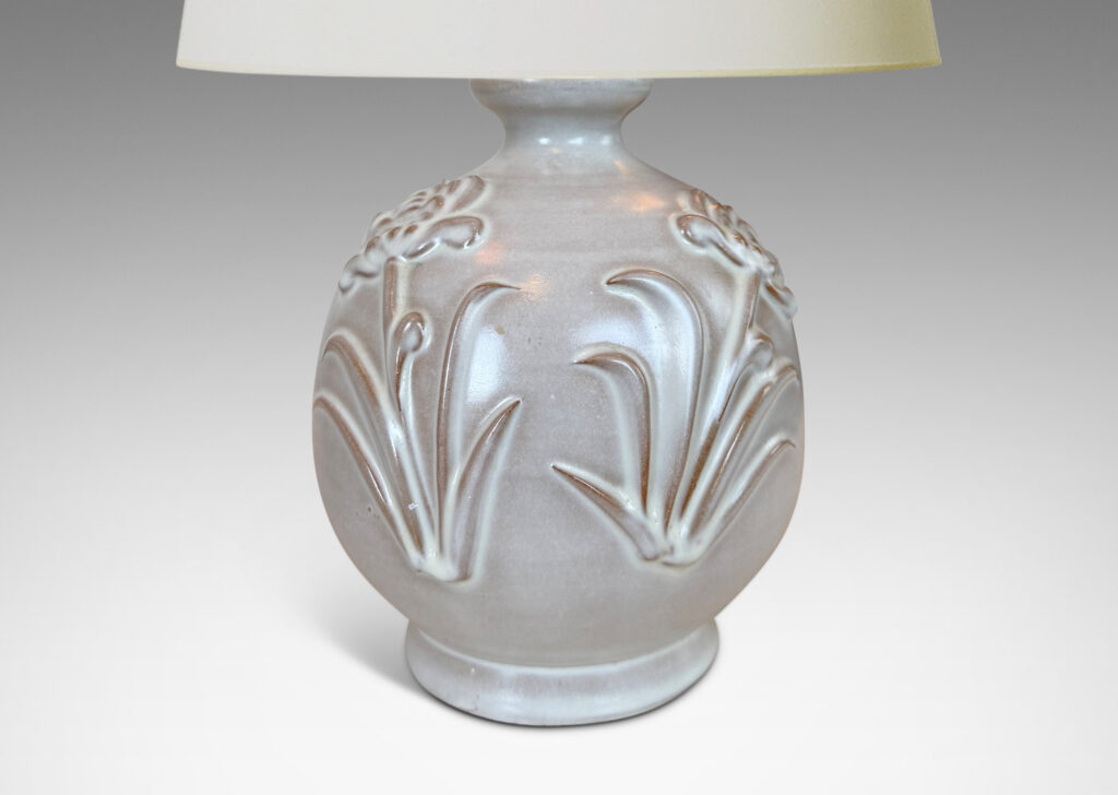 Gallery BACplump globe forms with relief pairs of flowers, lightly glazed in white