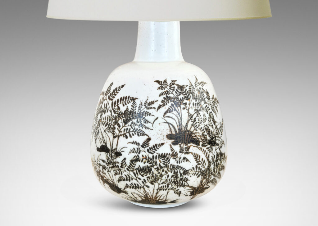 Gallery BAC compressed ovoid forms with necks, glazed in white with fern silhouette decorations in brown