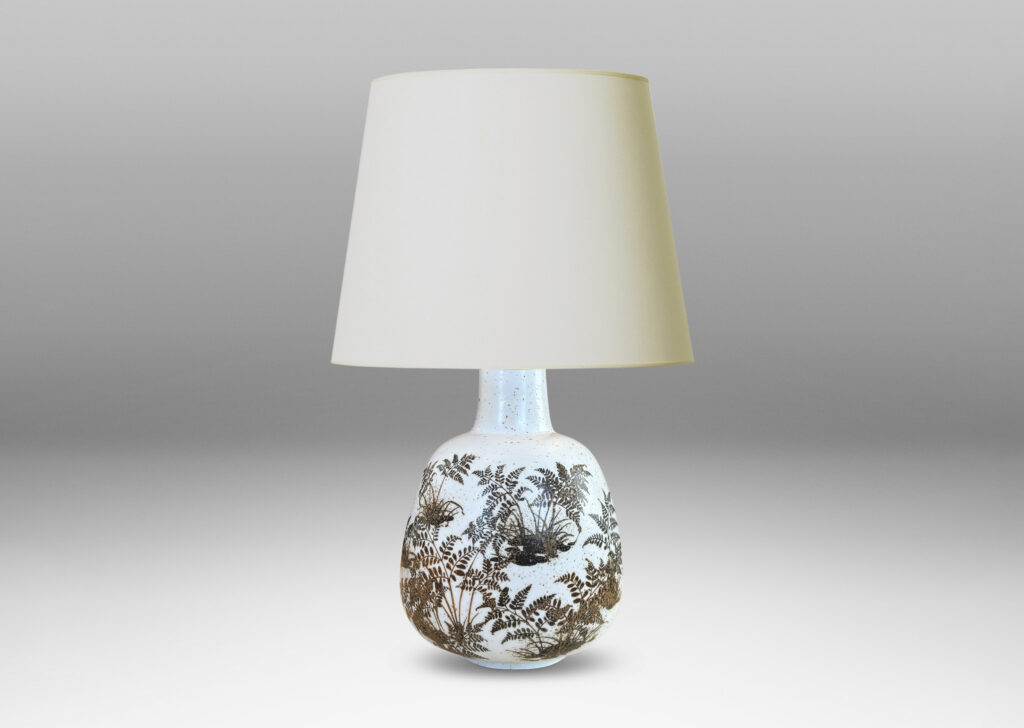Gallery BAC compressed ovoid forms with necks, glazed in white with fern silhouette decorations in brown