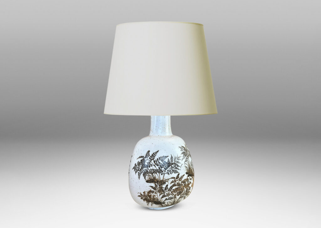 Gallery BAC compressed ovoid forms with necks, glazed in white with fern silhouette decorations in brown