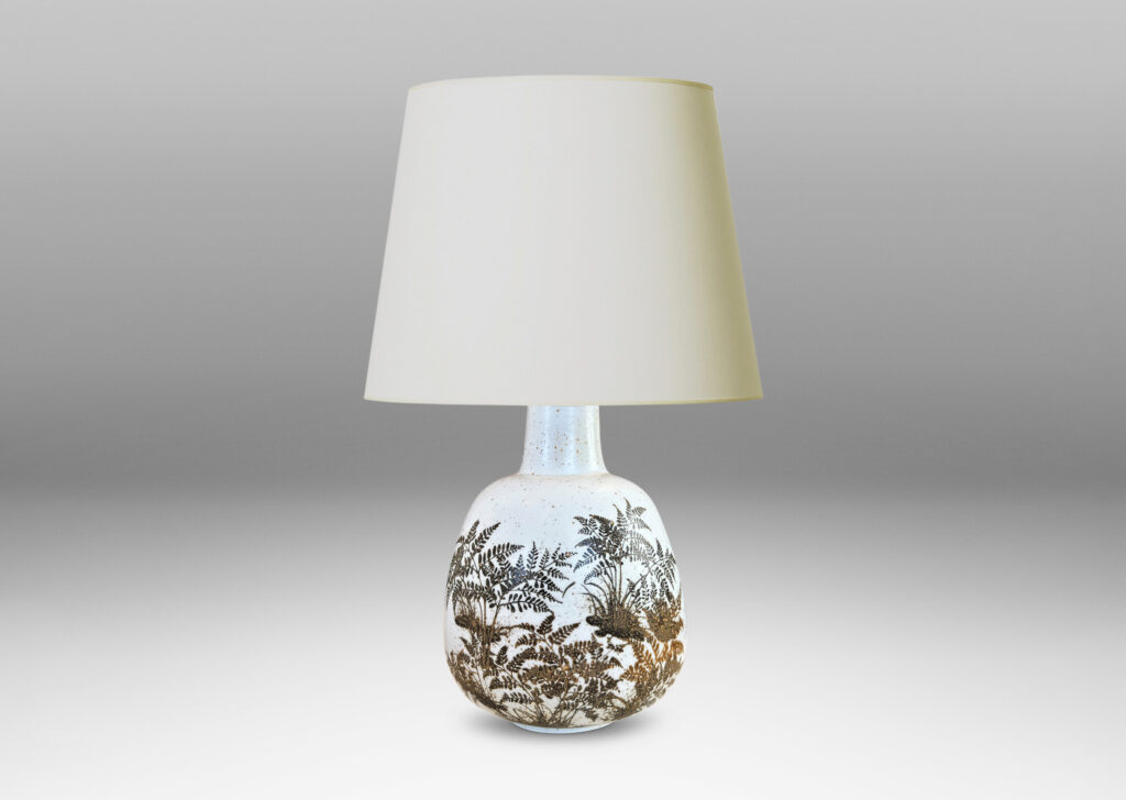 Gallery BAC compressed ovoid forms with necks, glazed in white with fern silhouette decorations in brown