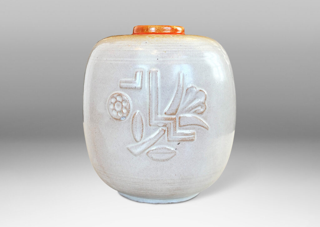 Gallery BAC ovoid form with relief abstract floral design, glazed in ivory and burnt orange