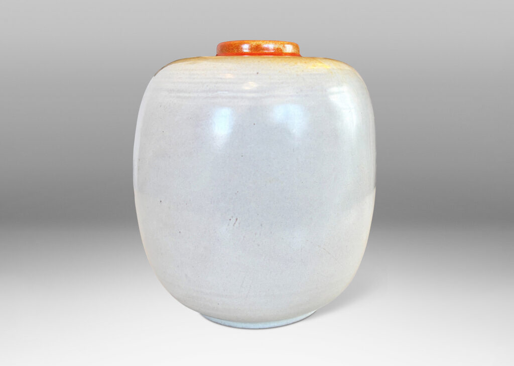 Gallery BAC ovoid form with relief abstract floral design, glazed in ivory and burnt orange