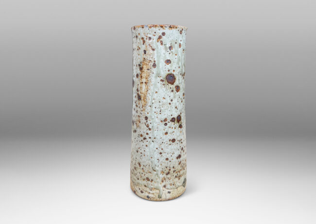 Gallery BAC all cylindrical form glazed in a shiny gray-green with brown speckles