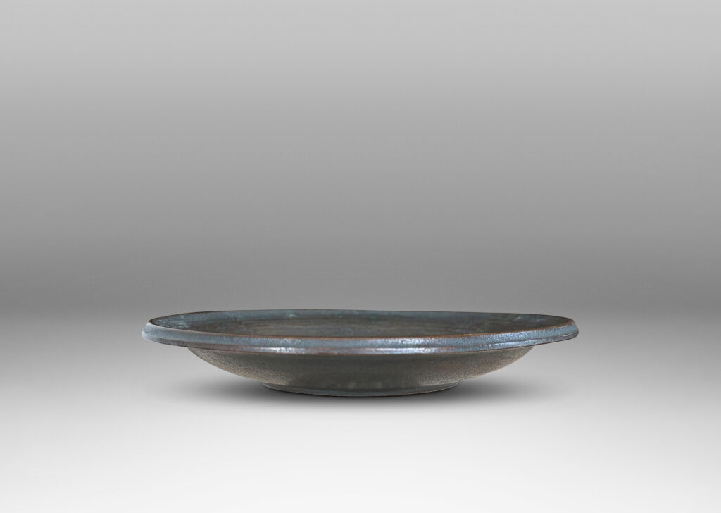 Gallery BAC bowl with painterly texture and naturalistic leaf cluster in relief