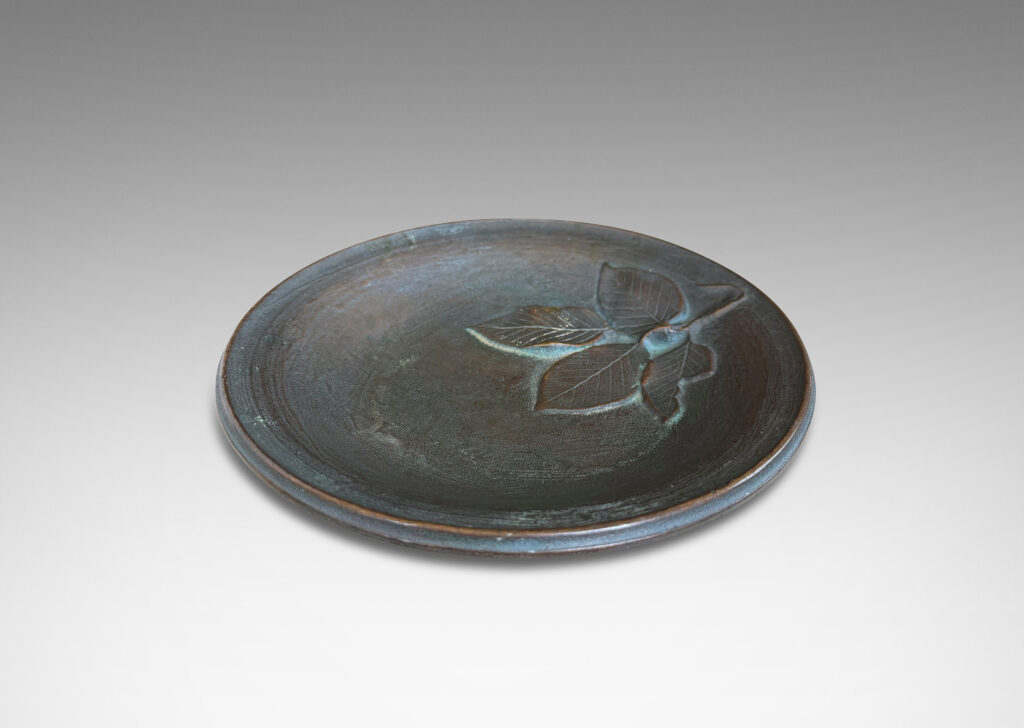 Gallery BAC bowl with painterly texture and naturalistic leaf cluster in relief