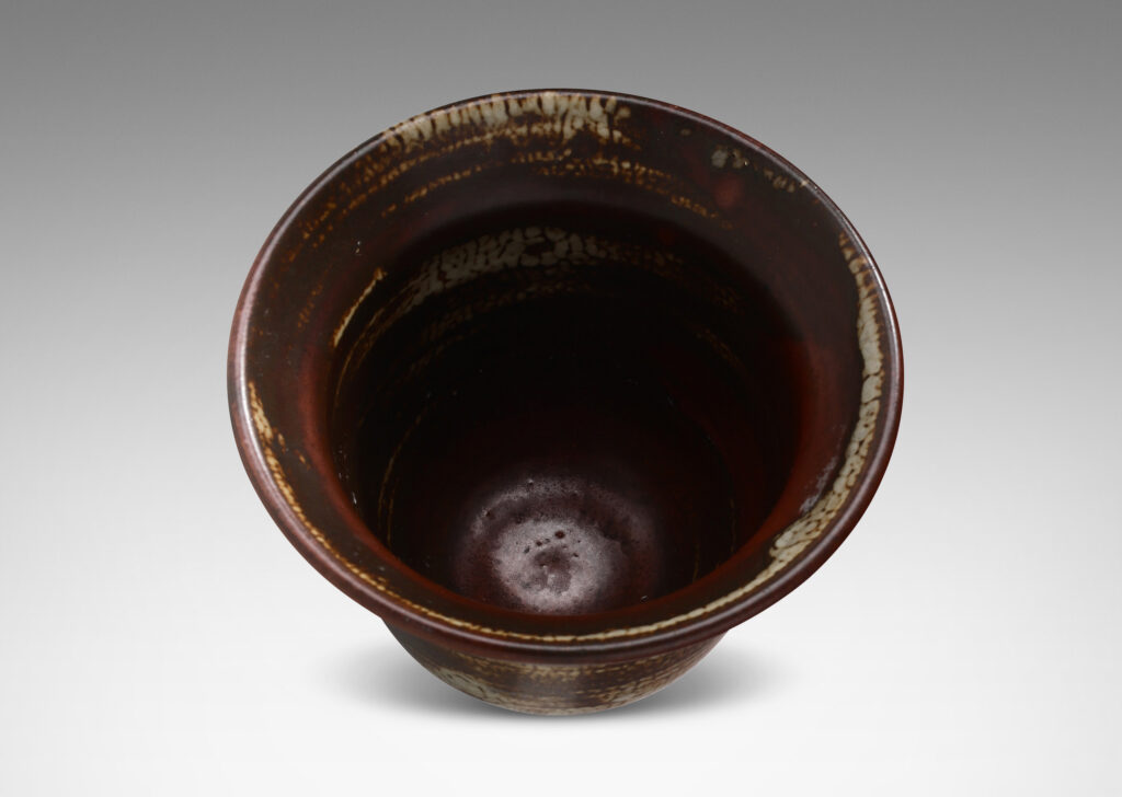 Gallery BAC elegant deep form with flaring lip, glazed in a striae brown and pale gray “Sung” glaze