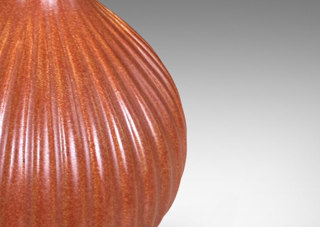 Gallery BAC reeded bulb form glazed in a burnt orange tone