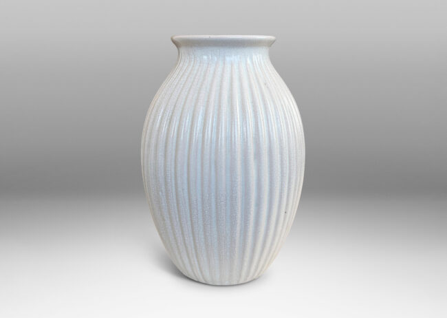Gallery BAC ribbed ovoid form with wide outstretched mouth, glazed in a semi-shine off-white glaze