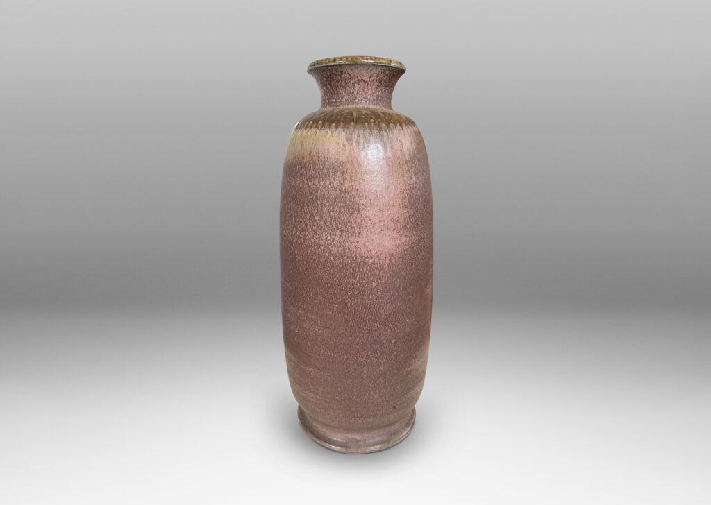 Gallery BAC tall ovoid form with flared mouth and neck, glazed in dark and cocoa brown