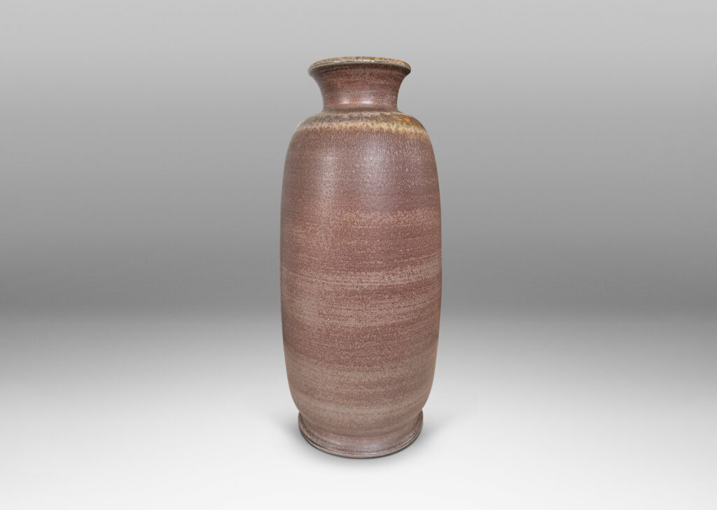 Gallery BAC tall ovoid form with flared mouth and neck, glazed in dark and cocoa brown