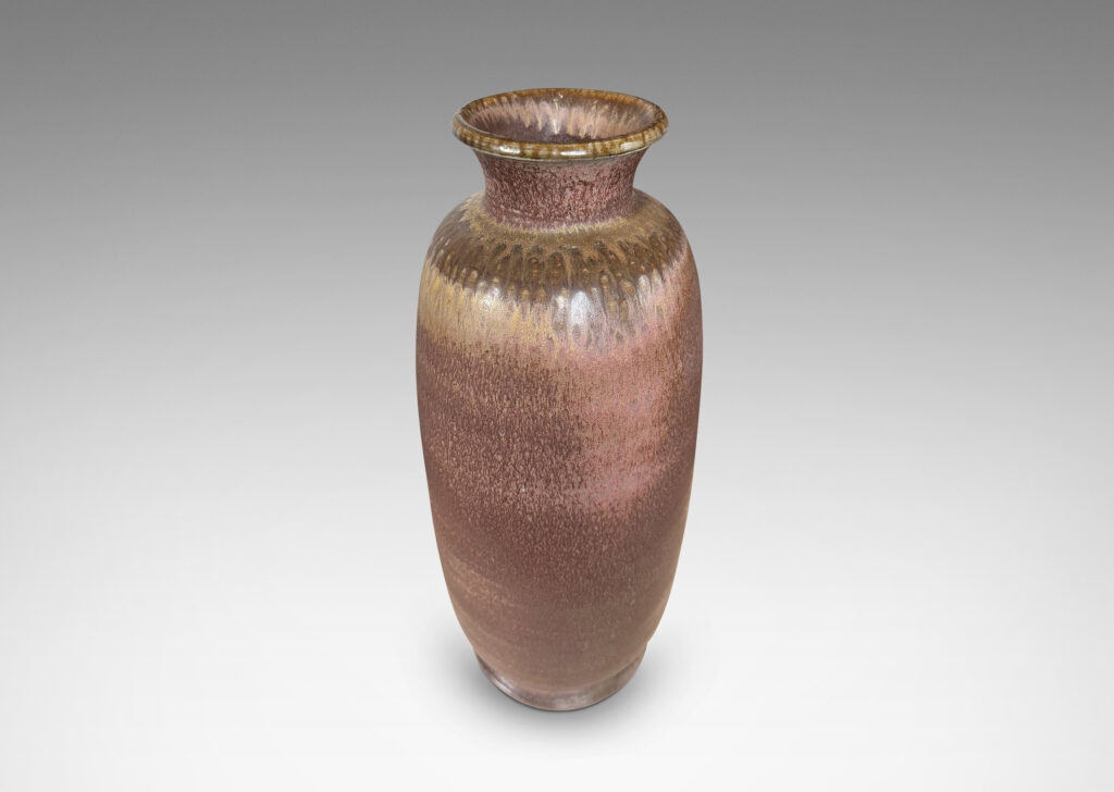 Gallery BAC tall ovoid form with flared mouth and neck, glazed in dark and cocoa brown
