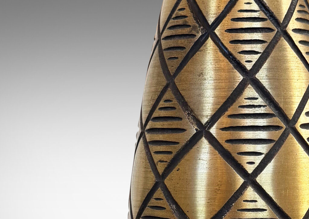 Gallery BAC pinecone-like form on a flared plinth, with deeply engraved diamond pattern