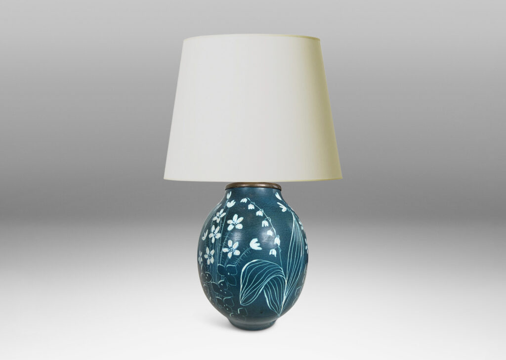 Gallery BAC ovoid form, glazed in turquoise with painterly wildflower designs in white