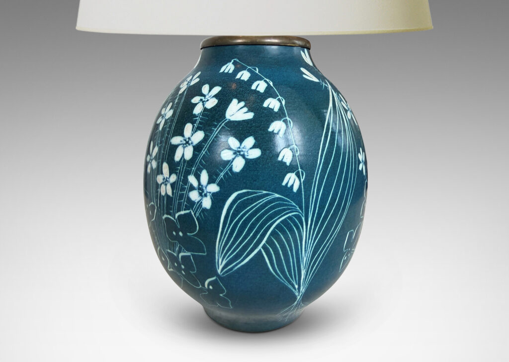 Gallery BAC ovoid form, glazed in turquoise with painterly wildflower designs in white