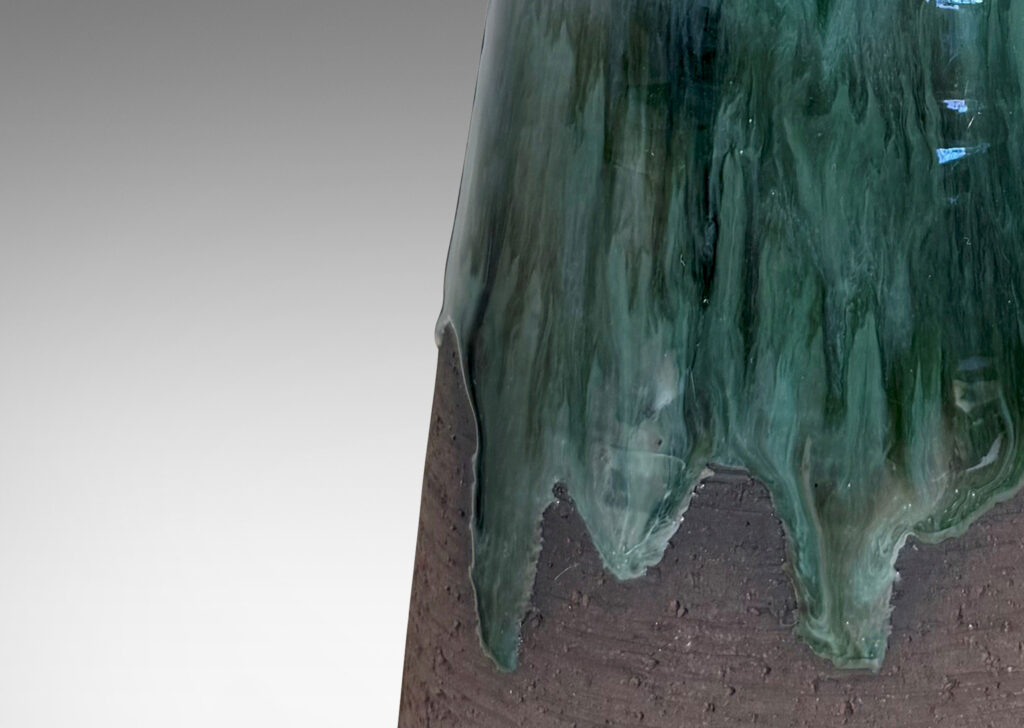 Gallery BAC conical form in matte brown overglazed with flowing glossy green-blue