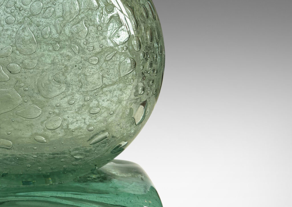 Gallery BAC disk form on a rectangular plinth, featuring the artist’s signature encased bubbles