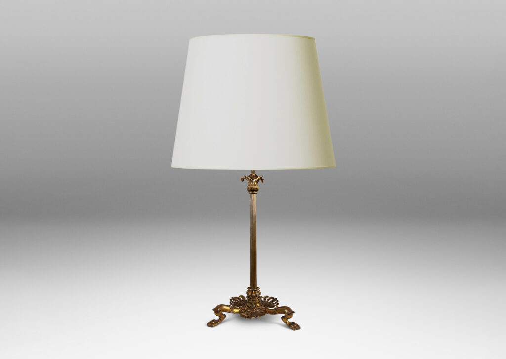 Gallery BAC fluted column stand on a tripod base in the form of springing lion feet with floating anthemia