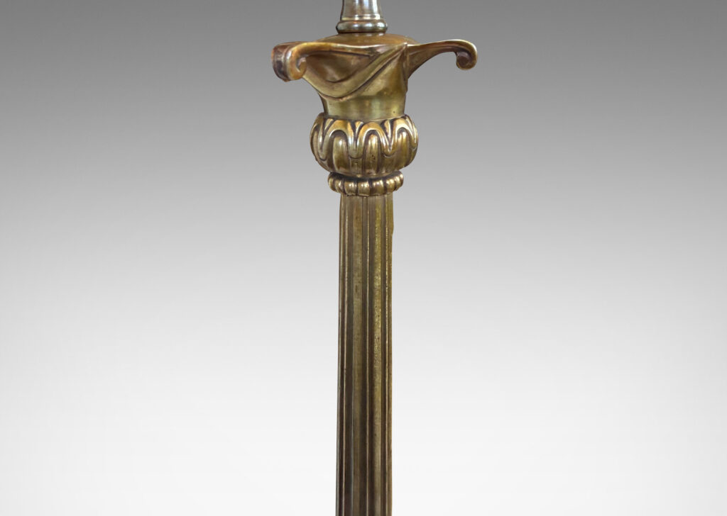 Gallery BAC fluted column stand on a tripod base in the form of springing lion feet with floating anthemia