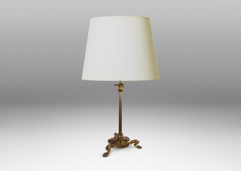Gallery BAC fluted column stand on a tripod base in the form of springing lion feet with floating anthemia