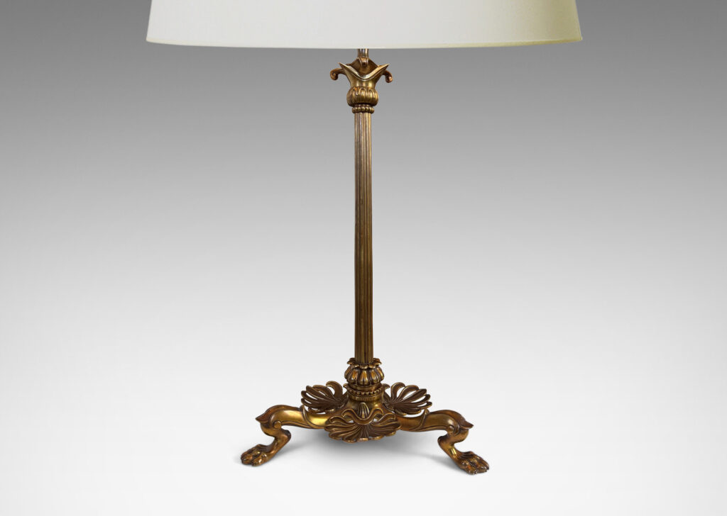 Gallery BAC fluted column stand on a tripod base in the form of springing lion feet with floating anthemia