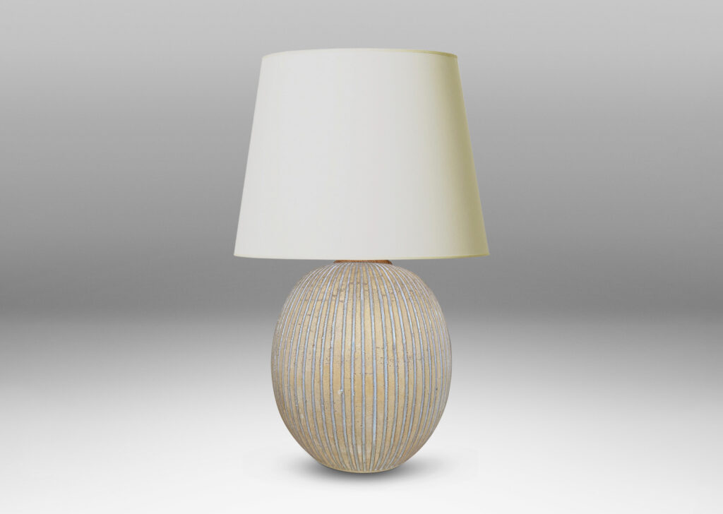 Gallery BAC light tan ovoid form with carved and white-glazed vertical pinstripes