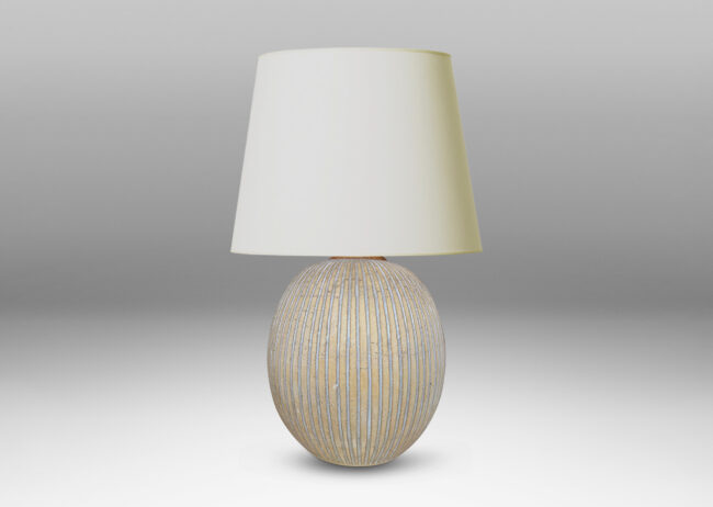 Gallery BAC light tan ovoid form with carved and white-glazed vertical pinstripes