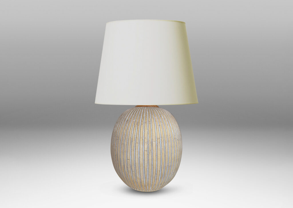 Gallery BAC light tan ovoid form with carved and white-glazed vertical pinstripes