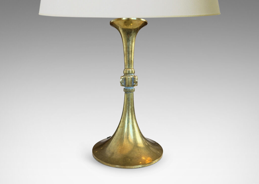 Gallery BAC flared ends joined by a central fob with sculpted cloud ball ornaments
