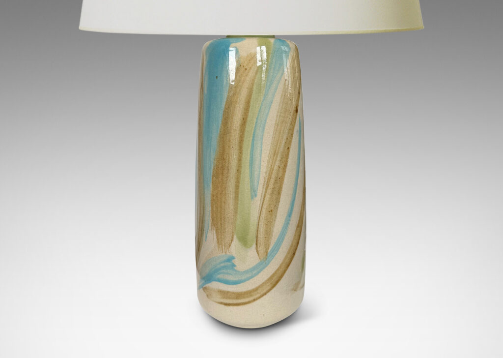 Gallery BAC upwardly tapered cylindrical form with reveal base and flange top, glazed in pale beige, with airily painted design in light brown, blue and green