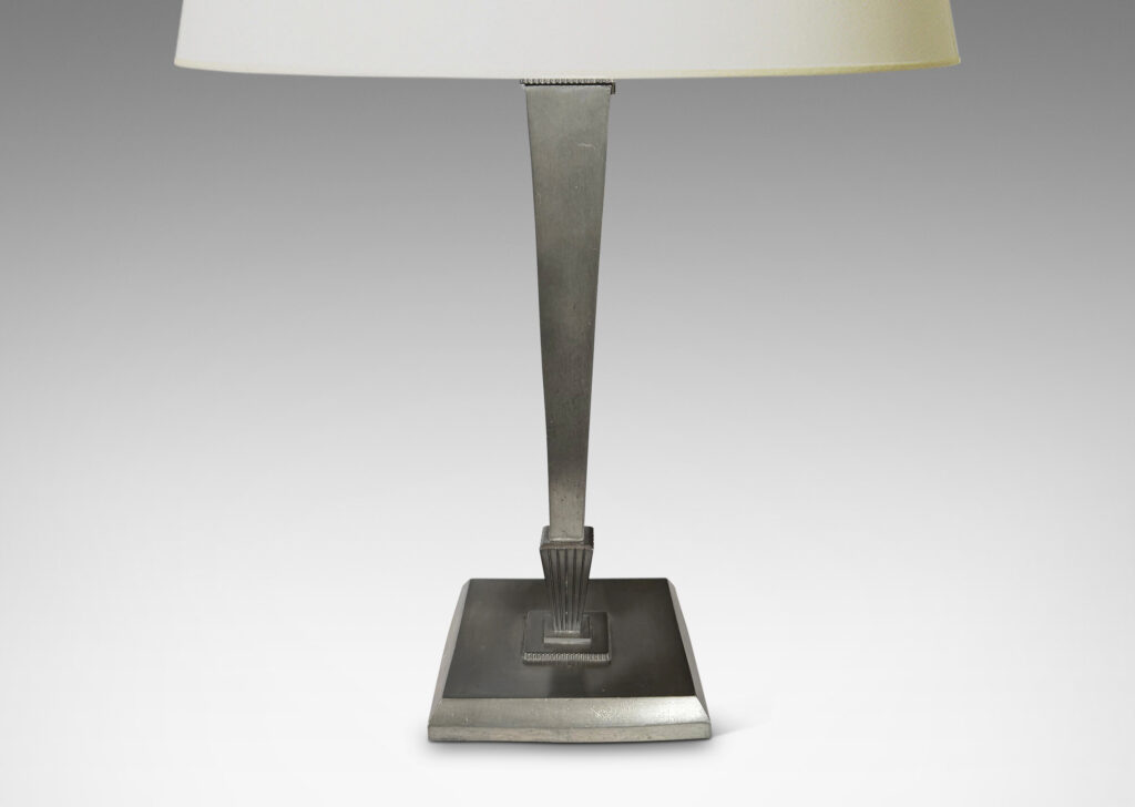 Gallery BAC tapered stand on a square plinth with reeded fan form fob