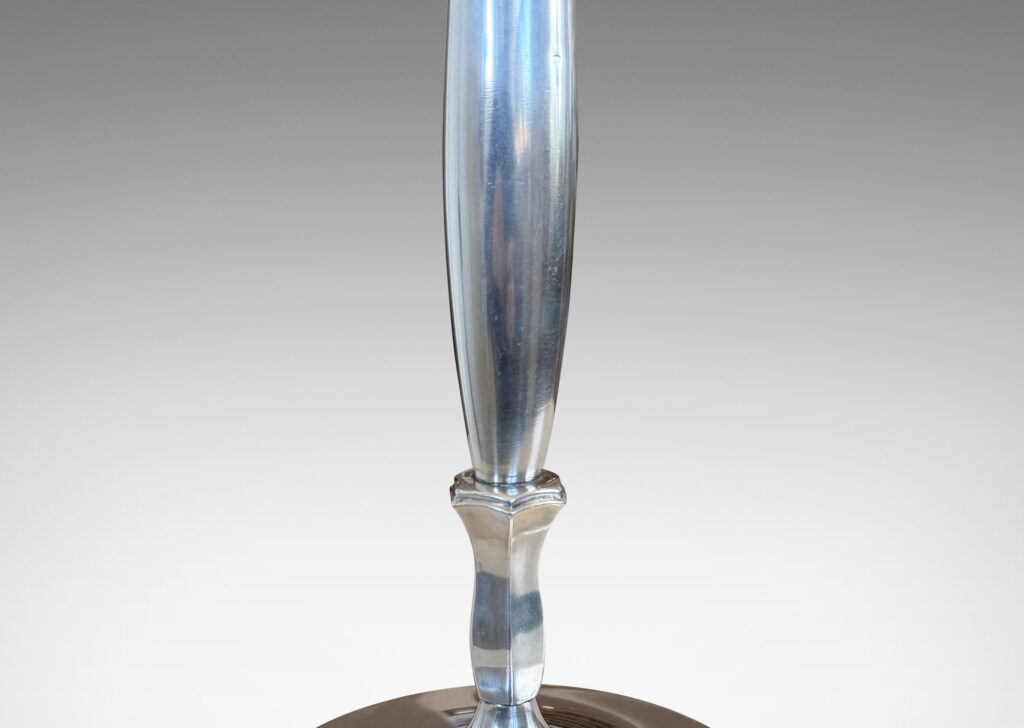 Gallery BAC sinuous swelling stand sprouting from an abstracted tulip form, mounted on disk stepped base