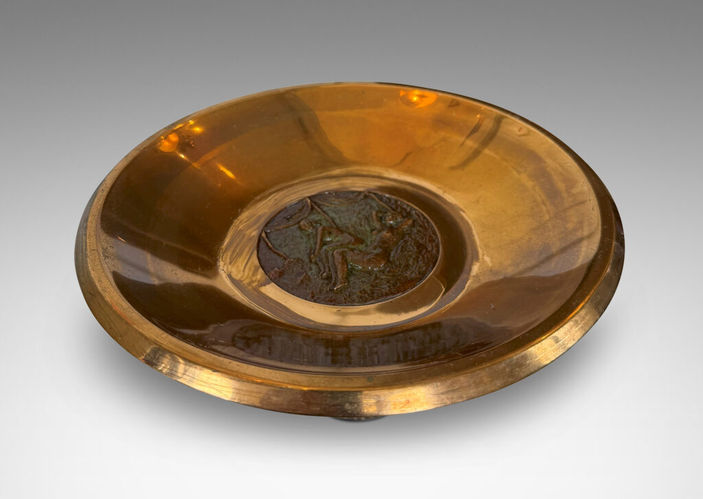 Gallery BAC sculpted form on a reveal plinth, with a central patinated medallion featuring female figures