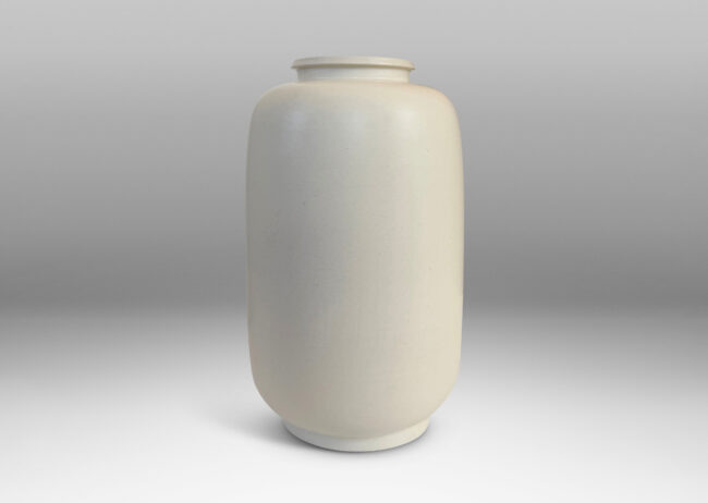 Gallery BAC all straight-sided ovoid form, with reveal base and flange lip, glazed in a velvet finish white with warm gray