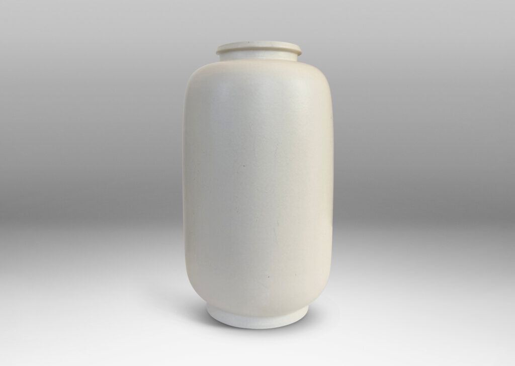 Gallery BAC all straight-sided ovoid form, with reveal base and flange lip, glazed in a velvet finish white with warm gray