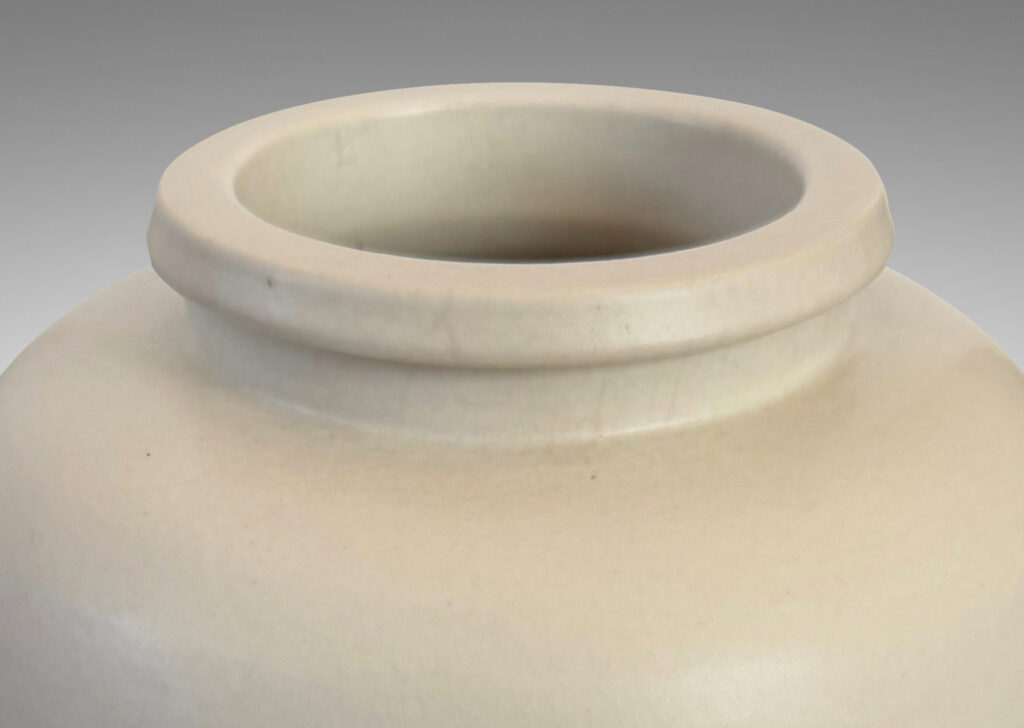 Gallery BAC all straight-sided ovoid form, with reveal base and flange lip, glazed in a velvet finish white with warm gray