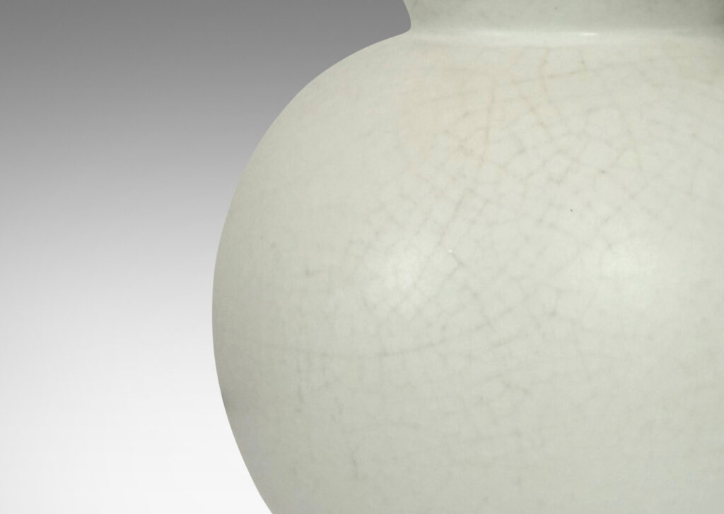 Gallery BAC small globe form with cuff lip, glazed in a velvet finish white with warm gray