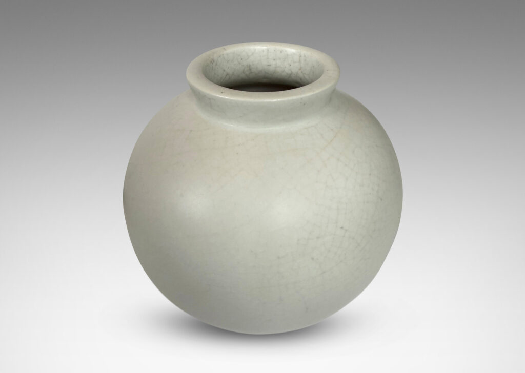 Gallery BAC small globe form with cuff lip, glazed in a velvet finish white with warm gray