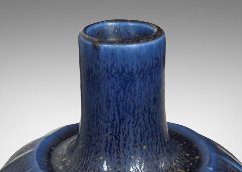 Gallery BAC globe form with swirling reliefs, glazed in a matte lapis blue