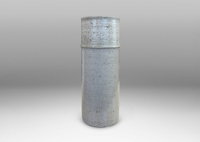 Gallery BAC cylindrical form with decorative notch detail, glazed in pale gray
