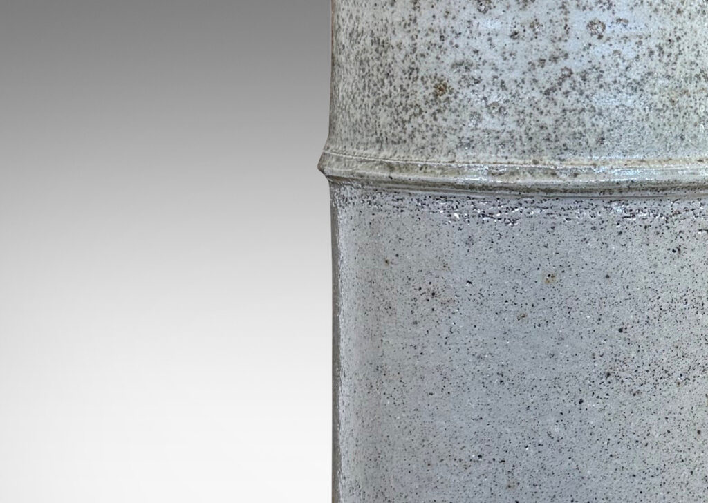 Gallery BAC cylindrical form with decorative notch detail, glazed in pale gray
