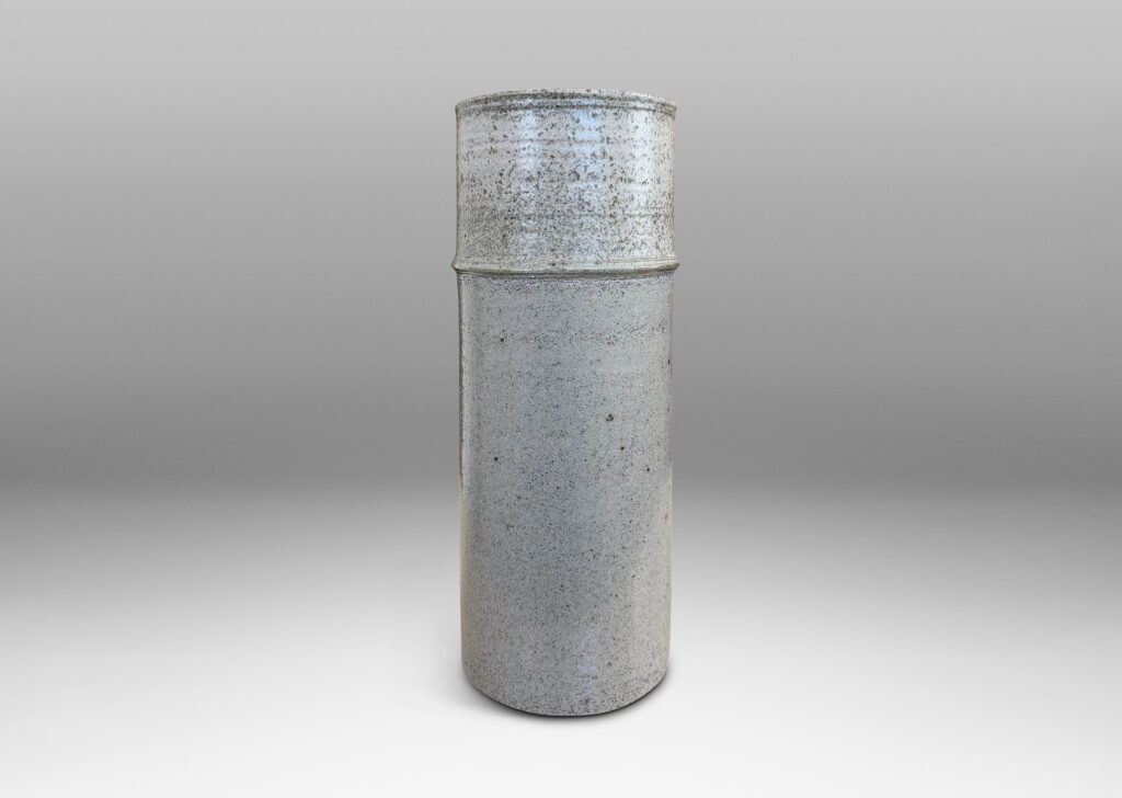 Gallery BAC cylindrical form with decorative notch detail, glazed in pale gray